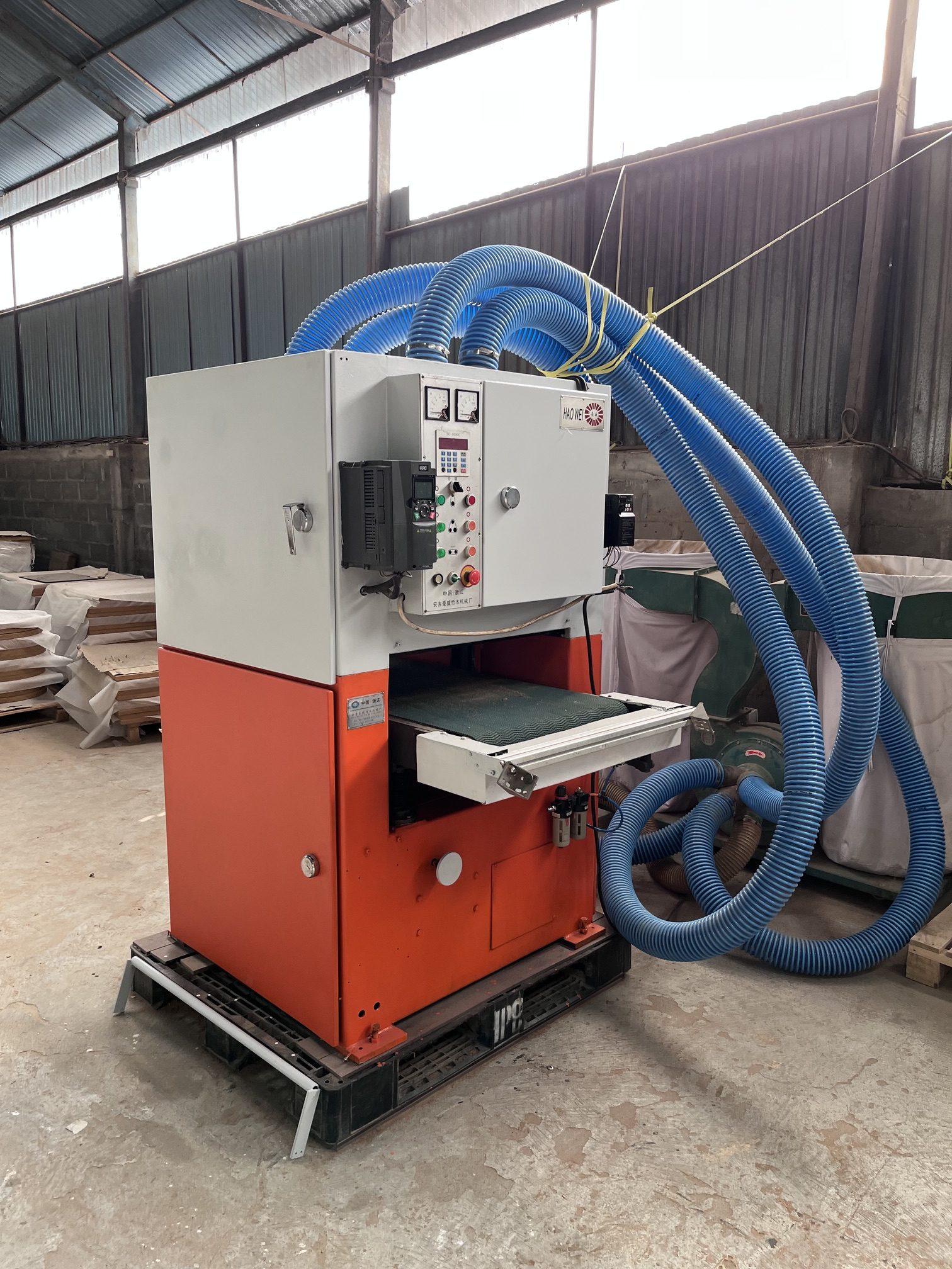 Sanding and finishing machine (extruder line) at the Destination Green WPC factory